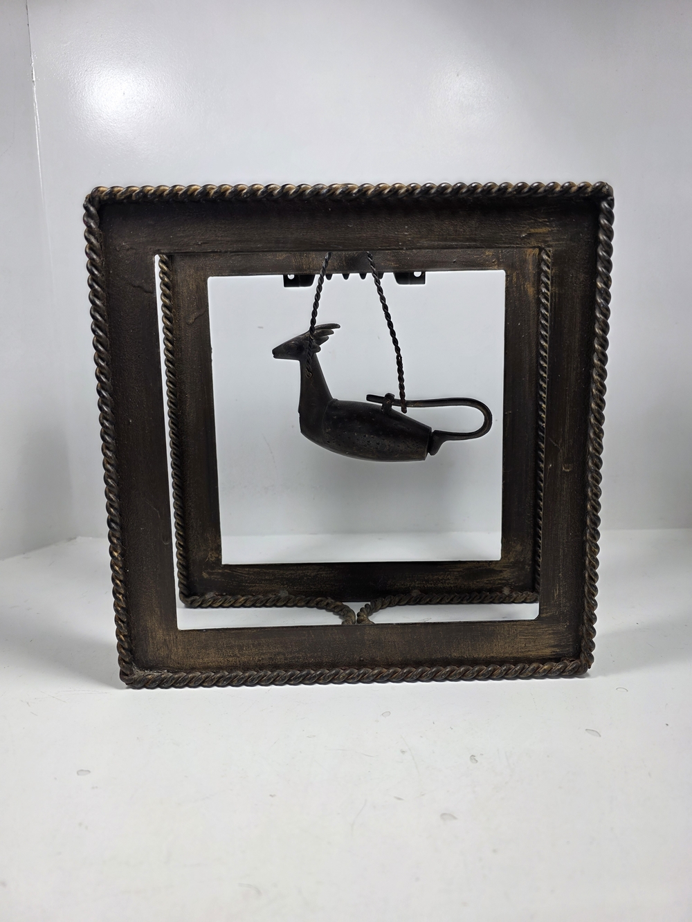 a vintage John-Richard Collection wall hanging sculpture box featuring a hanging